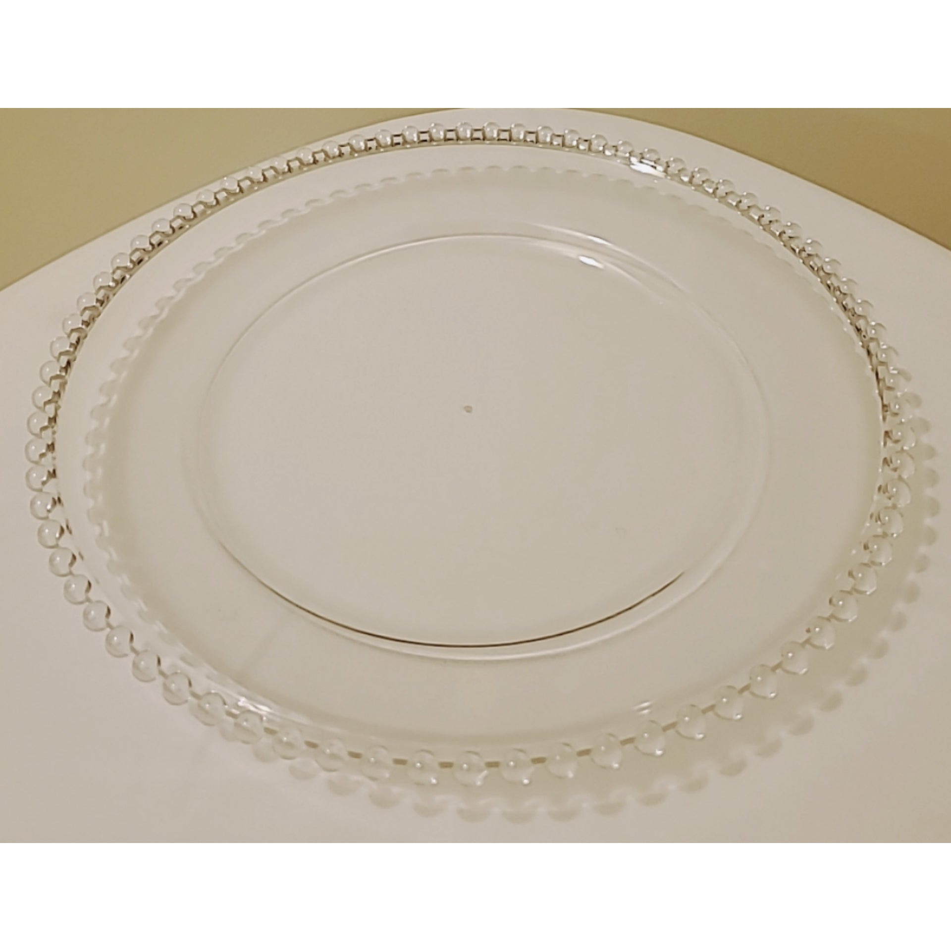 Clear Charger Plates with Beaded Rim.